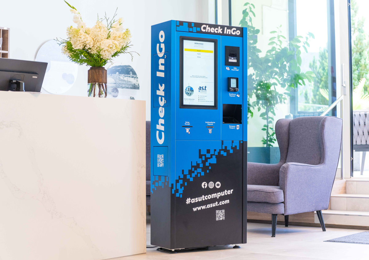 Compact hotel self-service check-in kiosk with Beetronics touchscreen, designed for 24/7 unattended operation.