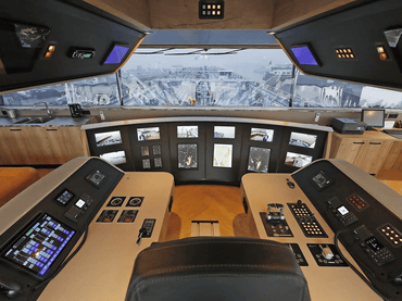 Ship bridge console with Beetronics marine displays integrated in panels.
